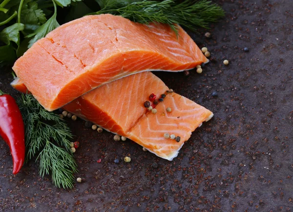 Fresh salmon (red fish) fillet with herbs, spices and vegetables - healthy food — Stock Photo, Image