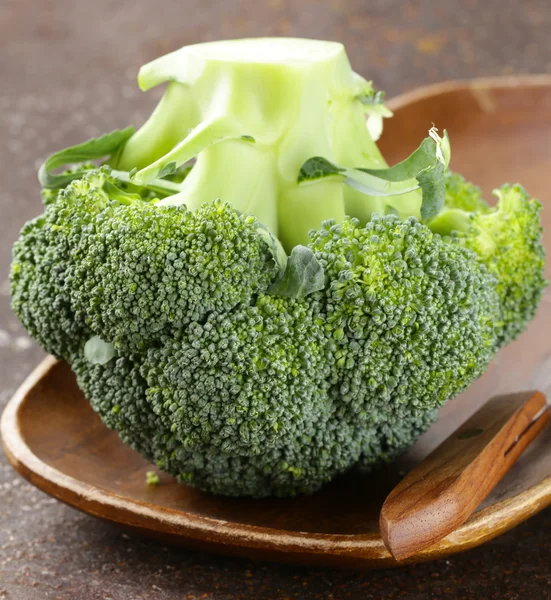 Fresh organic green cabbage broccoli on old iron table — Stock Photo, Image