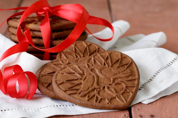 Chocolate cookies in the shape of heart, symbol of love — Stock Photo, Image