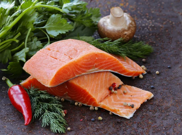 Fresh salmon (red fish) fillet with herbs, spices and vegetables - healthy food — Stock Photo, Image