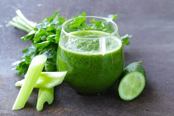 Fresh green juice from celery, cucumbers and parsley — Stock Photo, Image