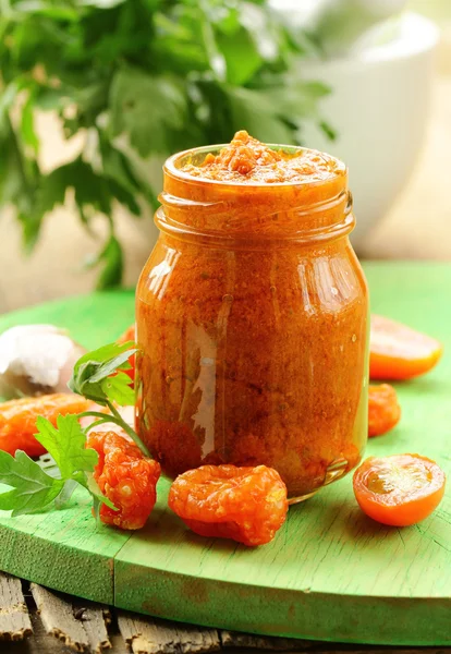 Italian red pesto of sun-dried tomatoes with garlic and herbs — Stock Photo, Image
