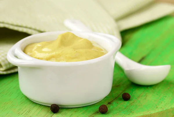 Natural mustard sauce in a white bowl — Stock Photo, Image