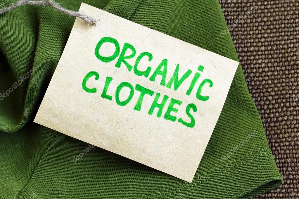 Green shirt made of natural fabrics with organic clothes label