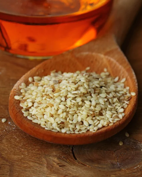 Sesame seeds on wooden background macro shot — Stock Photo, Image