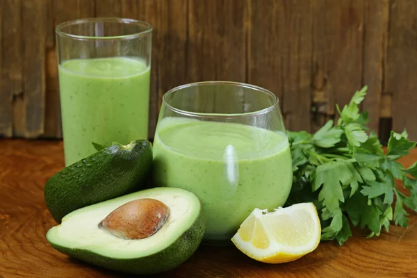 Natural drink a smoothie with avocado, herbs and yogurt — Stock Photo, Image