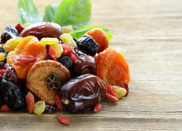 Assorted dried fruits (raisins, apricots, figs, prunes, goji, cranberries) — Stock Photo, Image