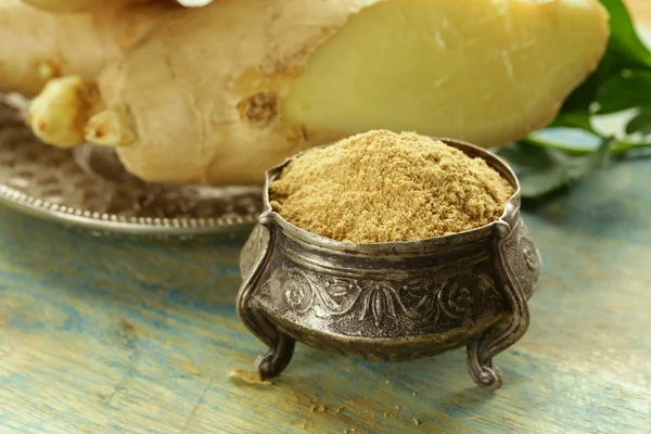 Ground and fresh ginger traditional oriental spice — Stock Photo, Image