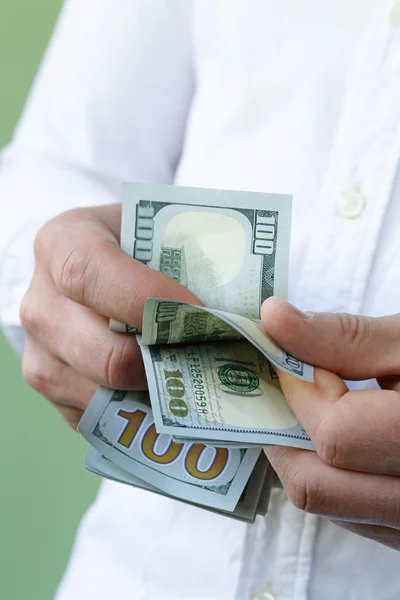 Businessman hands holding dollar cash - business, people, finances and money concept — Stock Photo, Image