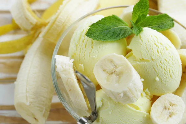 Fruit ice cream with fresh banana and mint — Stock Photo, Image