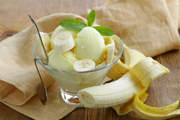 Fruit ice cream with fresh banana and mint — Stock Photo, Image