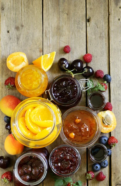 Assorted fruit berry jams (apricot, strawberry, raspberry, orange) — Stock Photo, Image