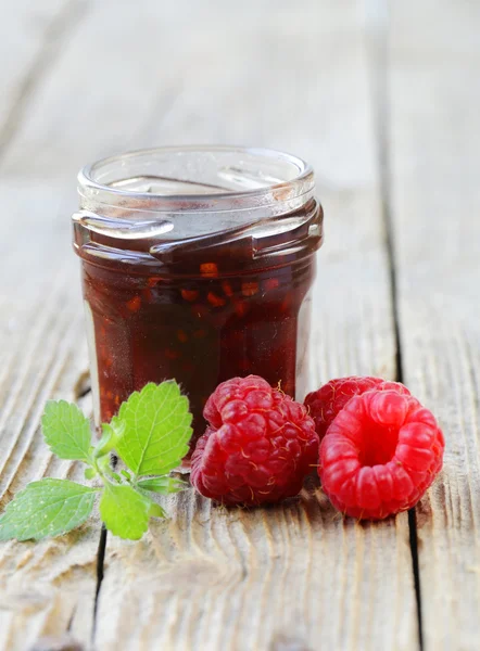 Natural organic homemade raspberry jam in a glass jar — Stock Photo, Image