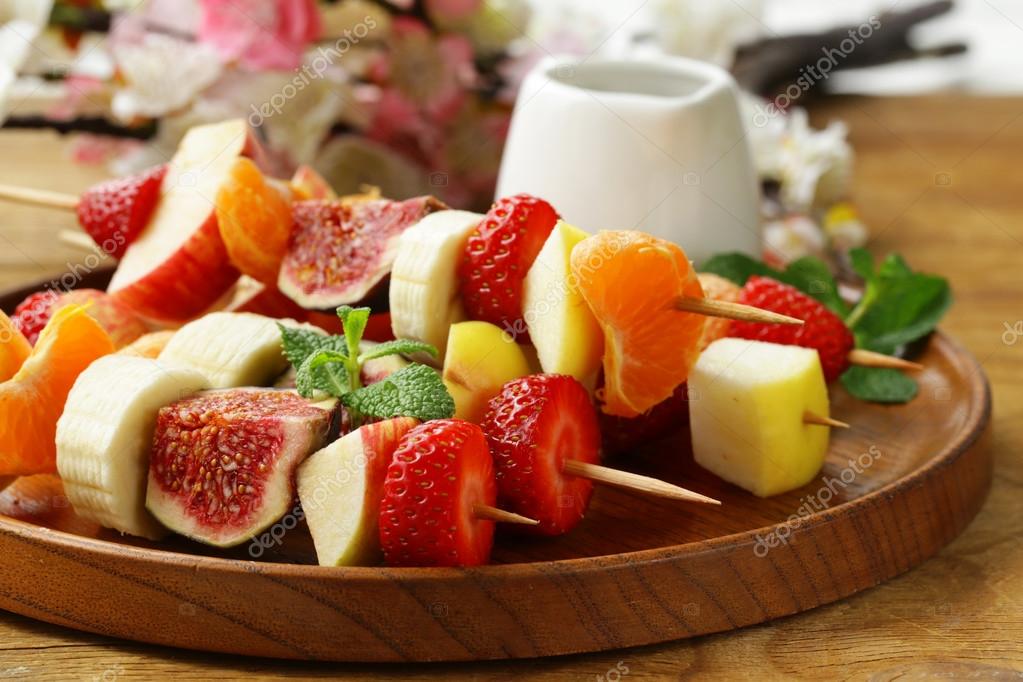 Fruit on wooden skewers dessert skewers — Stock Photo © Dream79 87259846
