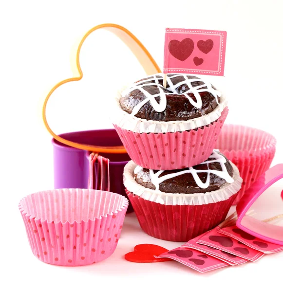 Festive pastry for Valentine's Day, chocolate muffin with red hearts — Stock Photo, Image