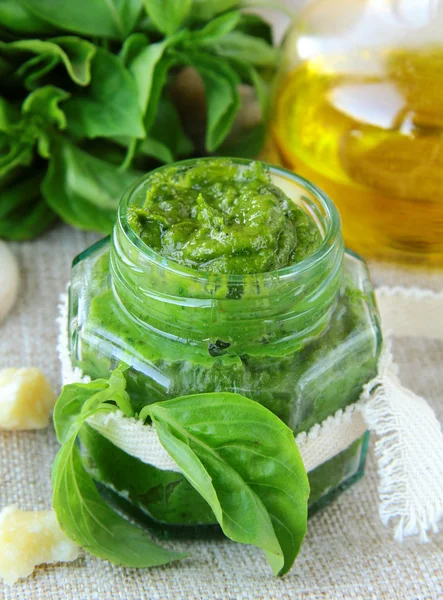 Homemade pesto sauce of green basil in a glass jar — Stock Photo, Image