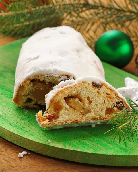 Traditional Christmas dessert Stollen with raisins and marzipan — Stock Photo, Image