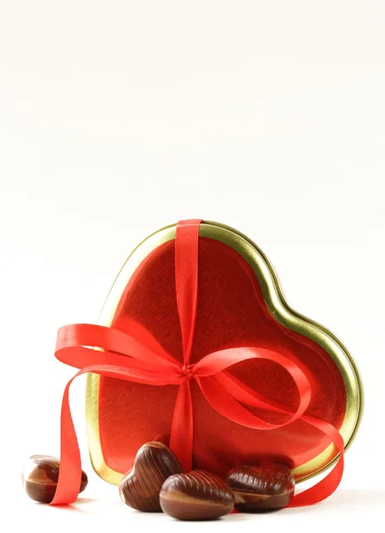 Heart box of chocolates and a macaroon for the holiday Valentines Day — Stock Photo, Image