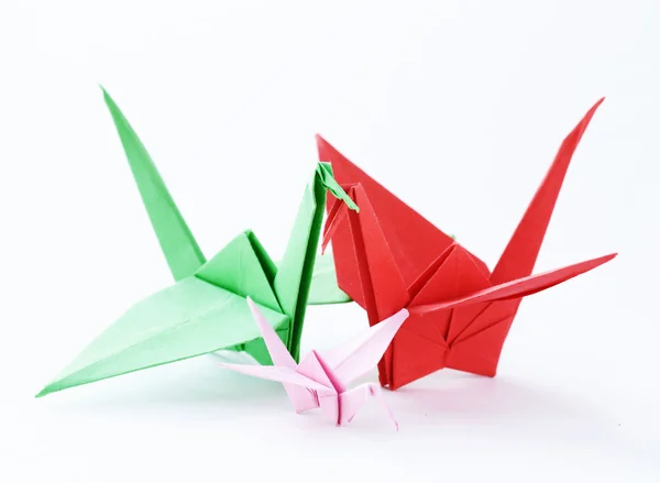 Colorful paper origami birds on a white background — Stock Photo, Image