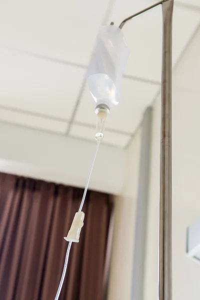 saline solution IV at hospital room