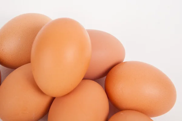 Chicken eggs  on white paper background — Stock Photo, Image