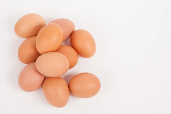 Chicken eggs  on white paper background — Stock Photo, Image