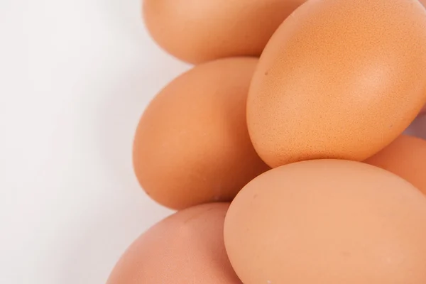 Chicken eggs  on white paper background — Stock Photo, Image