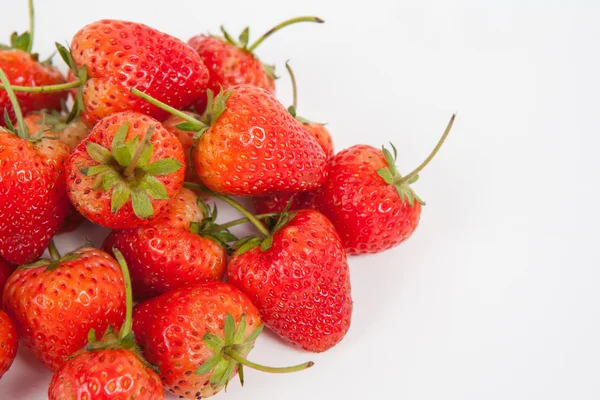 Erdbeere auf weißem Papier Hintergrund — Stockfoto