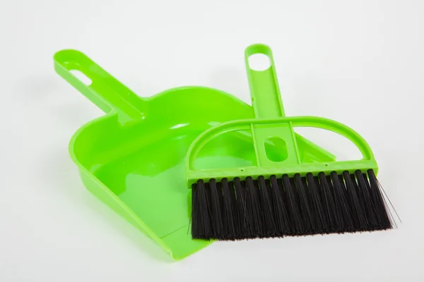 Garbage scoop and broom on white paper background — Stock Photo, Image