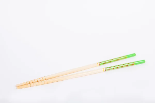 Chopsticks em um fundo de papel branco — Fotografia de Stock