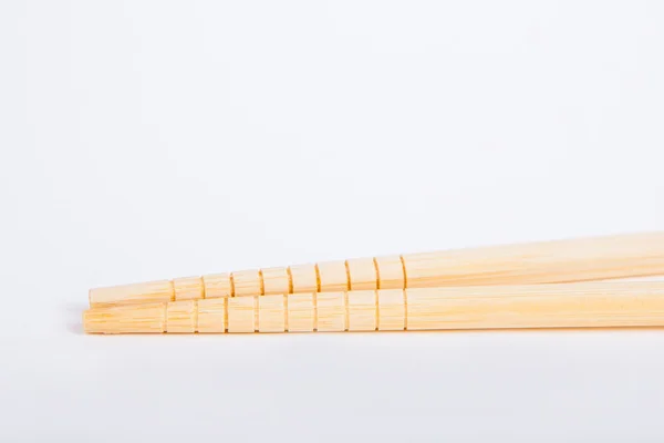 Chopsticks em um fundo de papel branco — Fotografia de Stock