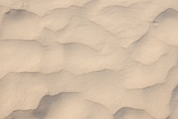 Closeup of sand pattern of a beach in the summer (sand texture) — Stock Photo, Image