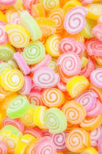 Jelly manis, rasa buah, permen makanan penutup penuh warna di atas kertas putih — Stok Foto