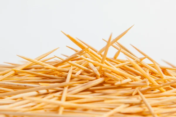 Bunch of toothpicks on white paper background — Stock Photo, Image
