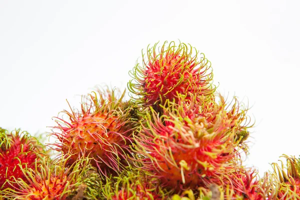 Rambutan dulce fruta deliciosa sobre fondo de papel blanco —  Fotos de Stock