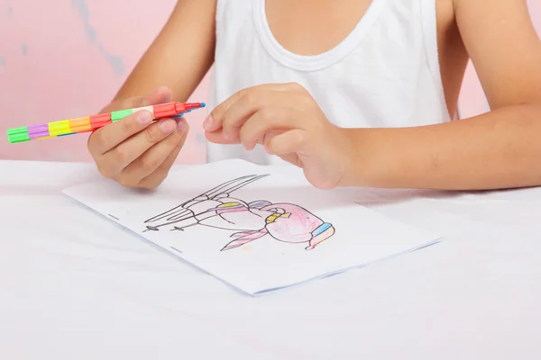 Asian boy Sitting coloring homework teachers assign. — Stock Photo, Image