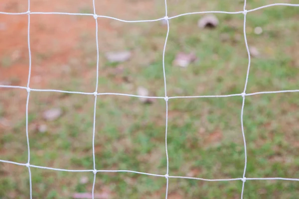 Fotbal gol net pe fundal neclară — Fotografie, imagine de stoc