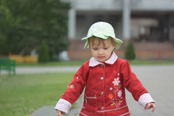 Little girl walking outdoors — Stock Photo, Image