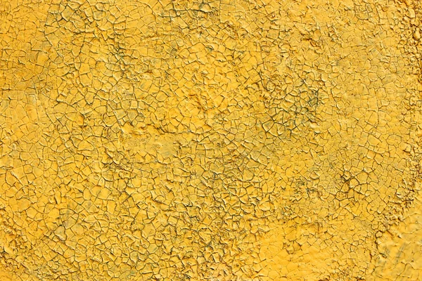 Shelled and cracked old painted yellow surface — Stock Photo, Image