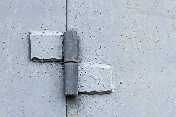 Metal hinge welded to steel plates and painted — Stock Photo, Image