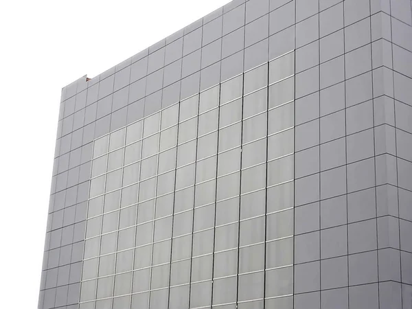 Outer wall of modern building over white — Stock Photo, Image