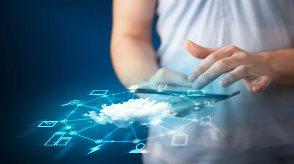 Close up of hand holding tablet with cloud network technology — Stock Photo, Image