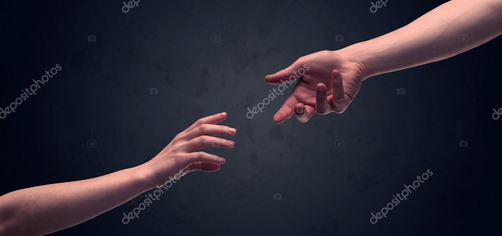 Hand im Begriff, eine andere zu berühren — Stockfoto © ra2studio 100279262