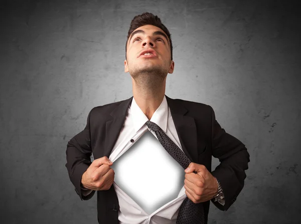 Businessman tearing off his shirt with white copyspace on chest — Stock Photo, Image