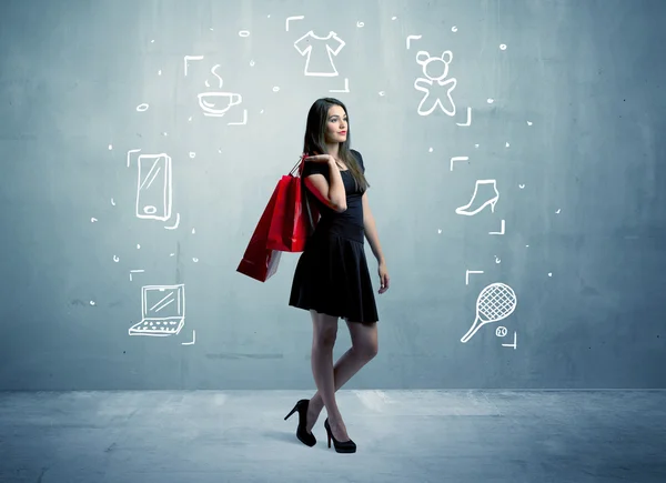 Shopping female with bags and drawn icons — Stock Photo, Image