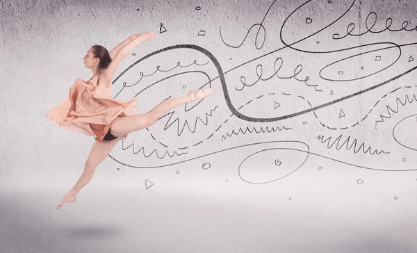 Танцовщица балета исполняет художественные танцы с линиями и стрелами — стоковое фото