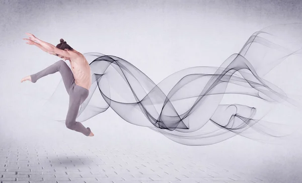 Modern ballet dancer performing with abstract swirl — Stock Photo, Image