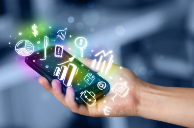 Finans ve pazar simgelerine ve sembollerine sahip akıllı telefon