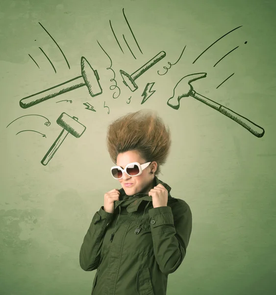 Tired woman with hair style and headache hammer symbols — Stock Photo, Image