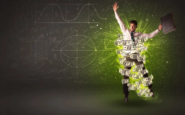 Cheerful businesman jumping with dollar banknotes around him — Stock Photo, Image